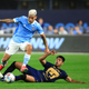 NYCFC midfielder Santiago Rodriguez jumps over Pumas’ midfielder Gerardo Moreno during a 2021 Leagues Cup Quarterfinals match.
